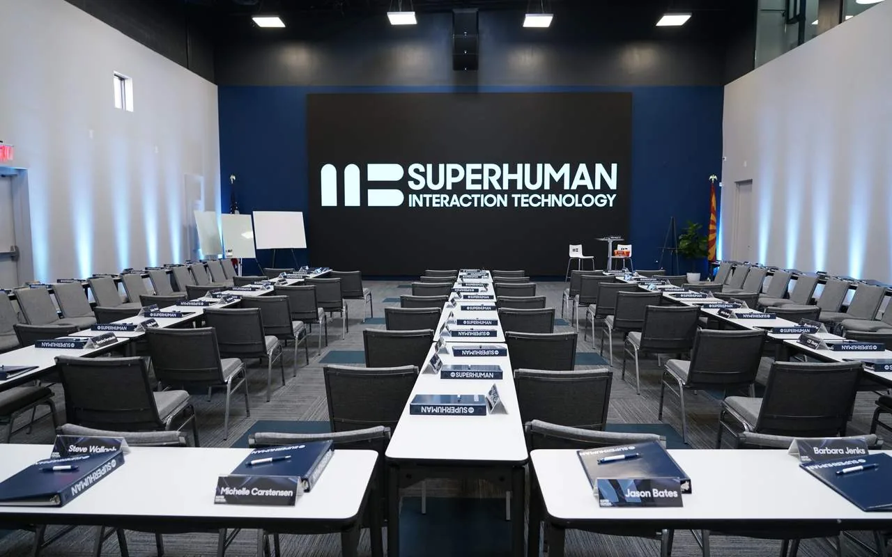 The main hall in classroom layout facing the large-format LED video wall