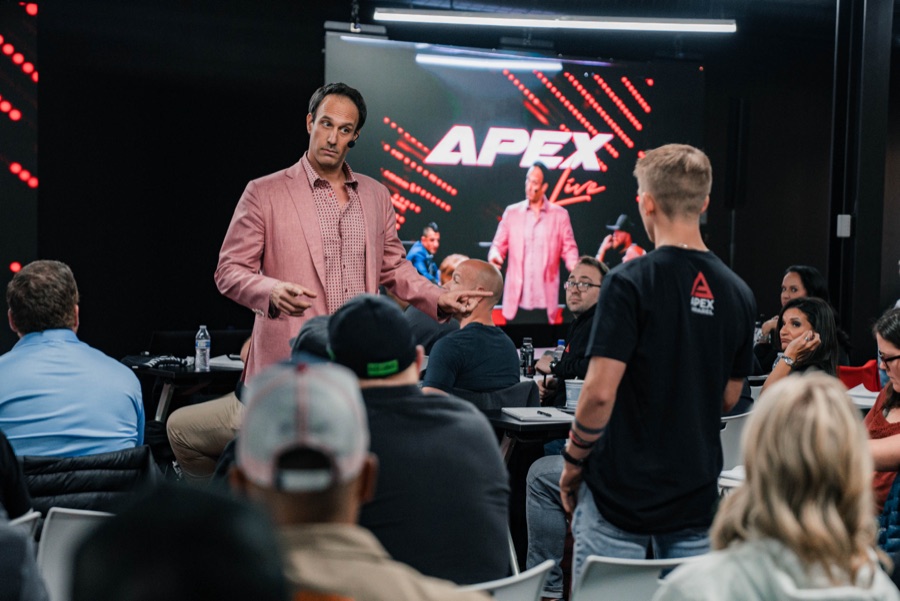 Michael Bernoff speaking on stage at APEX Live